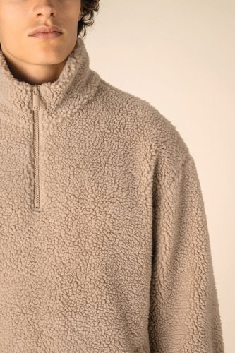 Felpa unisex 1/4 zip in sherpa con spalle spioventi
